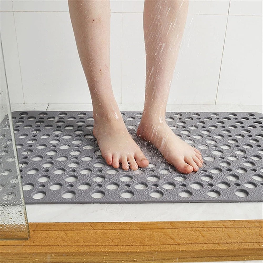 High-quality non-slip bath mat, offering safety, comfort, and a sleek addition to bathroom decor.