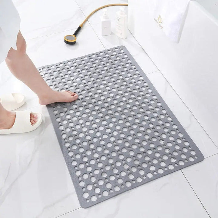 Soft non-slip shower mat, ideal for family bathrooms, ensuring safety and a pleasant bathing experience.