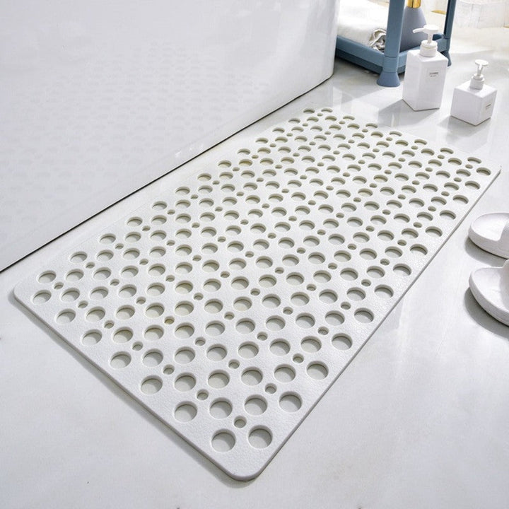 White non-slip shower mat for a clean, modern bathroom look, ensuring safety & comfort.