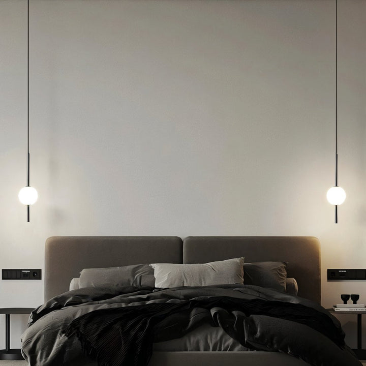 Sleek brass Nordic LED pendant, adjustable, brightens modern homes with elegant lighting.