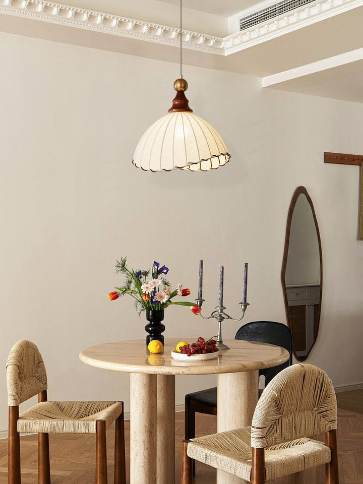Pleated fabric ceiling light, modern design, gold finish, brings elegance to any room.