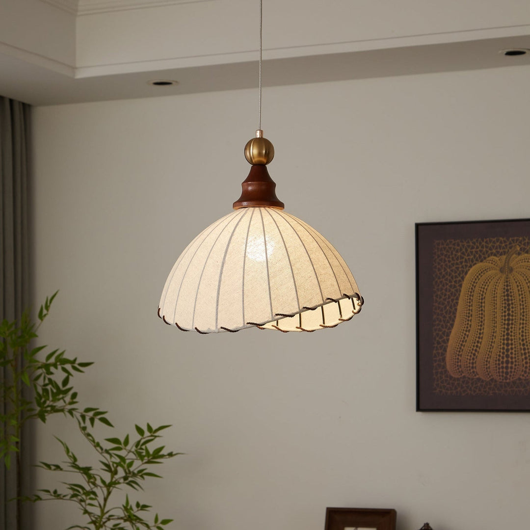 Elegant fabric shade pendant lamp, modern design with wood accent & adjustable light.