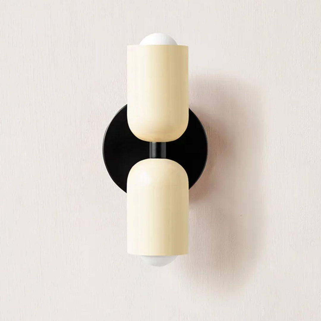 Modern Scandinavian double wall lamp, providing ambient and decorative lighting for a stylish home.