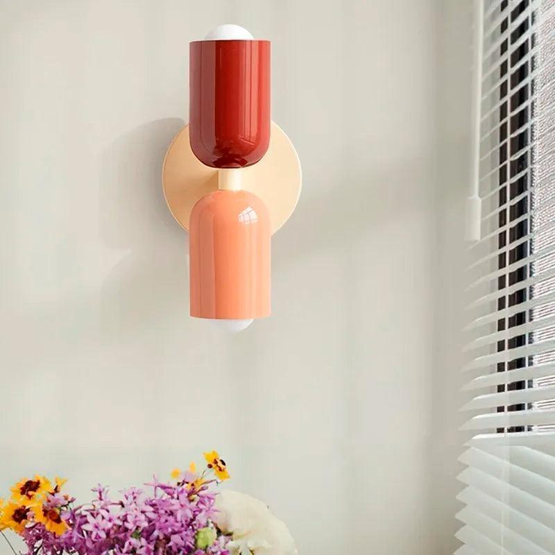 Stylish artistic double wall lamp, modern Scandinavian, casting soft ambient light for hallway.