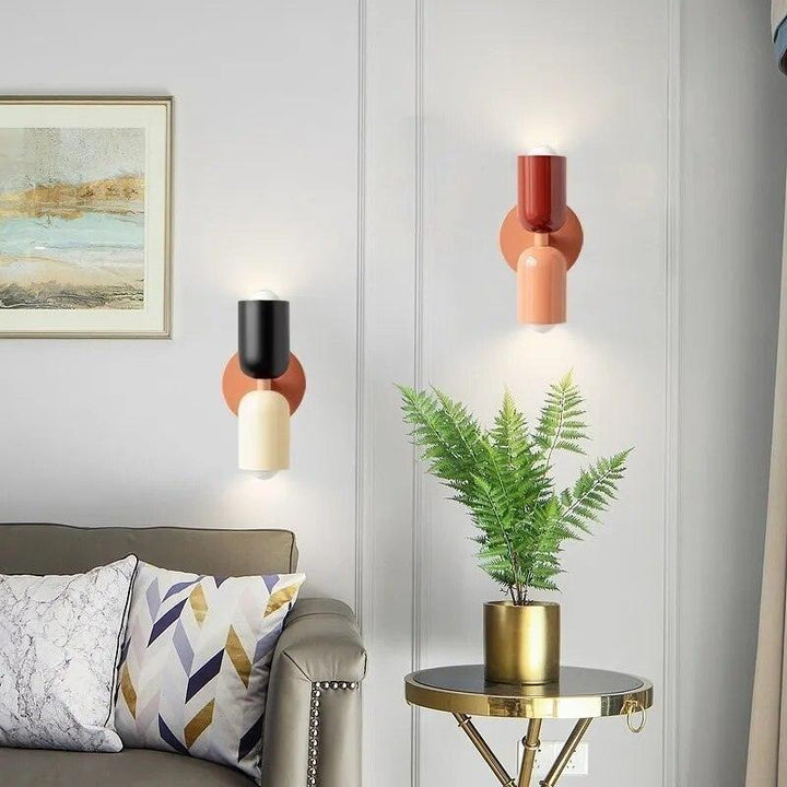 Elegant double wall lamp, Scandinavian aesthetic, providing ambient lighting for a stylish living space.