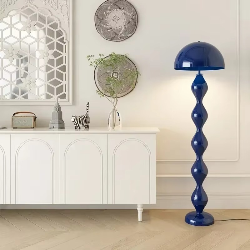Sleek black Scandinavian LED floor lamp, a standing light ideal for living room ambient lighting.