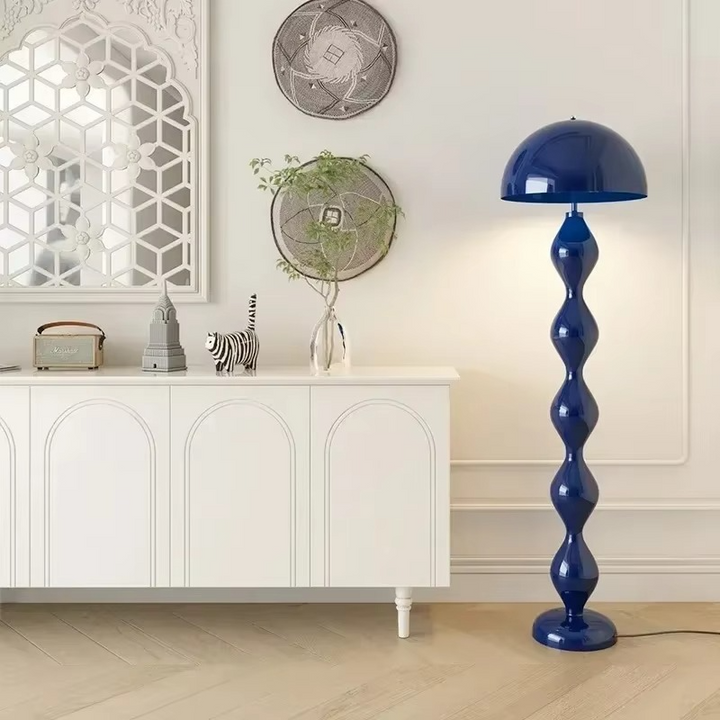 Sleek black Scandinavian LED floor lamp, a standing light ideal for living room ambient lighting.