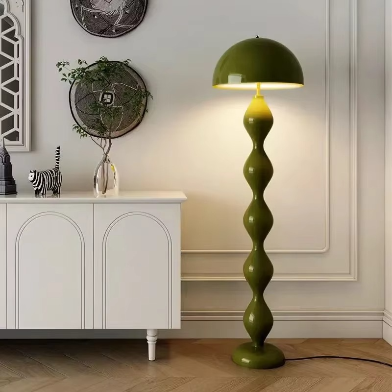 "Modern Scandinavian floor lamp with sleek metal frame and glowing shade in minimalist design for contemporary home decor."