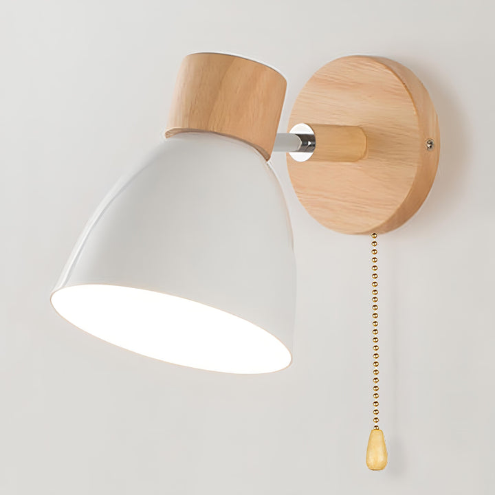 Contemporary minimalist wall light with convenient pull switch for reading nooks.