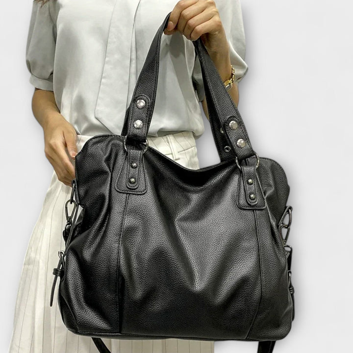 Chic women's handbag, a modern and sleek accessory for any fashion-forward ensemble.