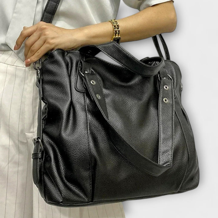 Sleek shoulder bag for women, a contemporary design that complements diverse summer styles.