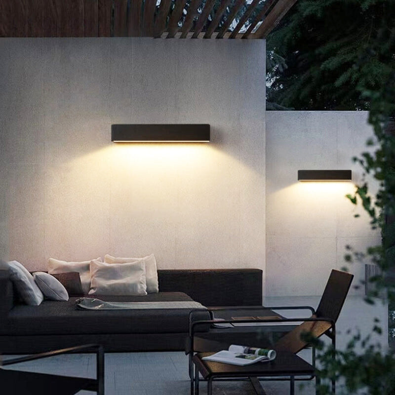 Eco-friendly solar LED outdoor wall light, energy-efficient for modern garden, patio & facade lighting.