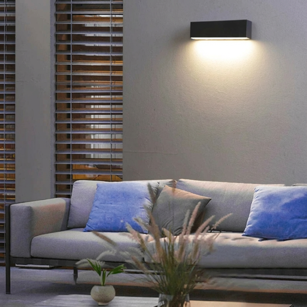 Minimalist solar outdoor LED wall light, IP65 waterproof for modern facades & pathways.