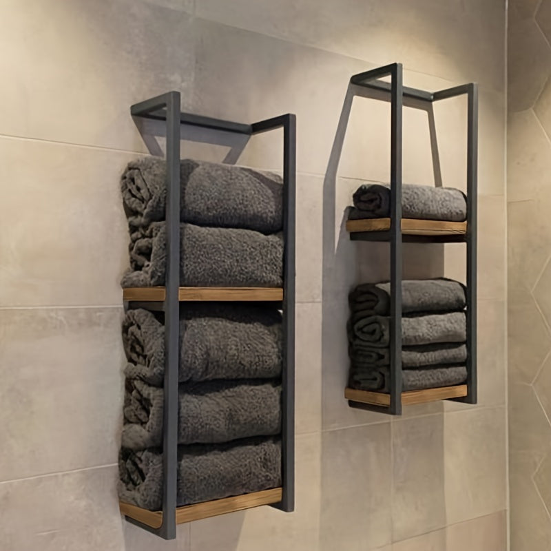 Modern stainless steel wall-mounted towel rack, perfect for small bathrooms & organizing towels efficiently.