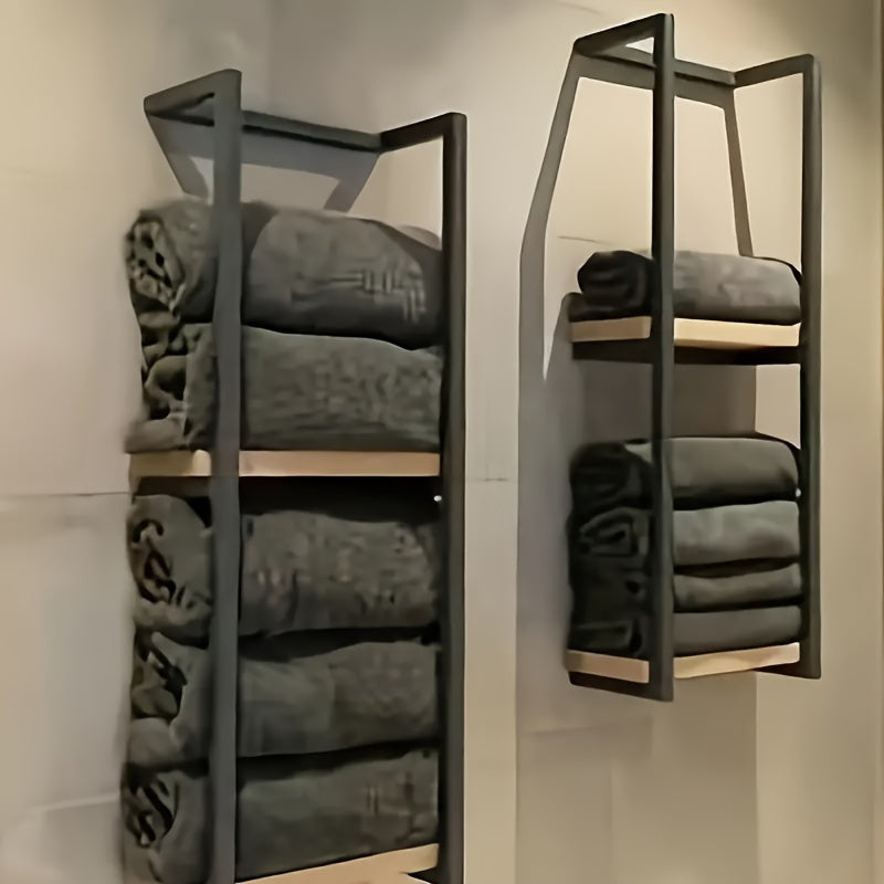 Contemporary wall-mounted stainless steel towel storage. A space-saving solution for modern bathroom decor.