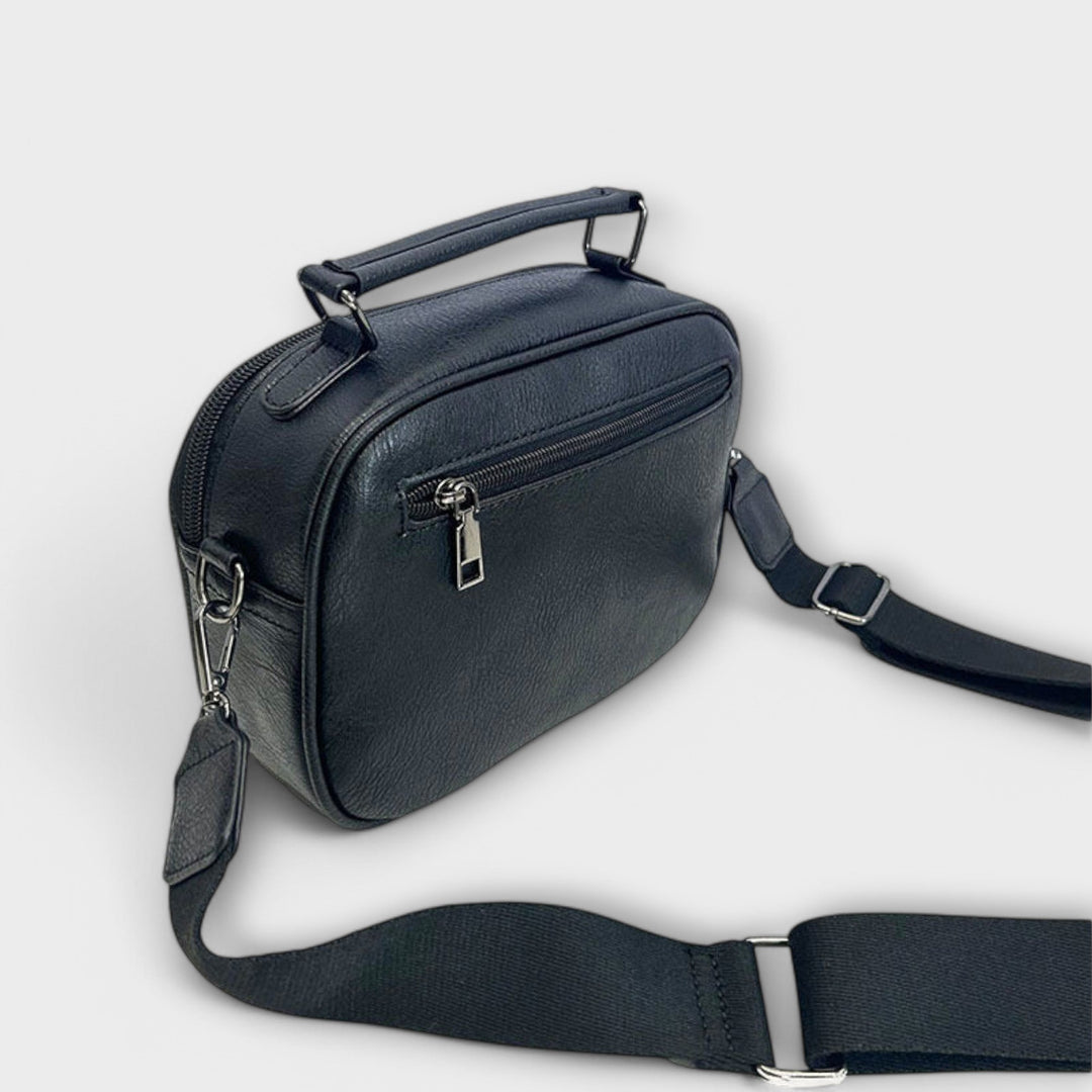 Everyday women's crossbody bag, a modern accessory with structured lines for versatile styling.