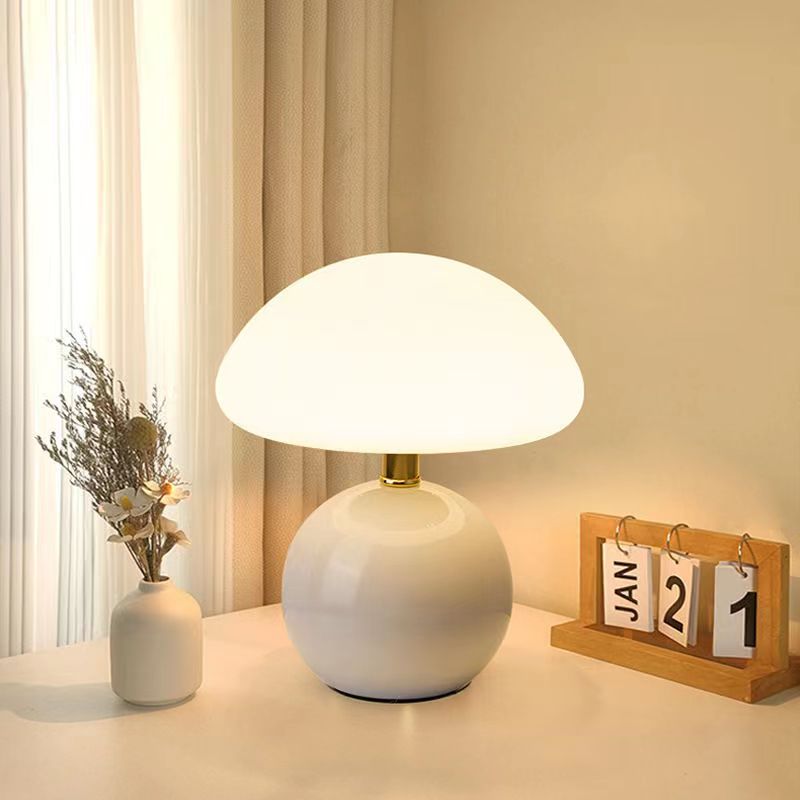 Mushroom table lamp with adjustable LED colors, perfect for modern home decor and ambient lighting.