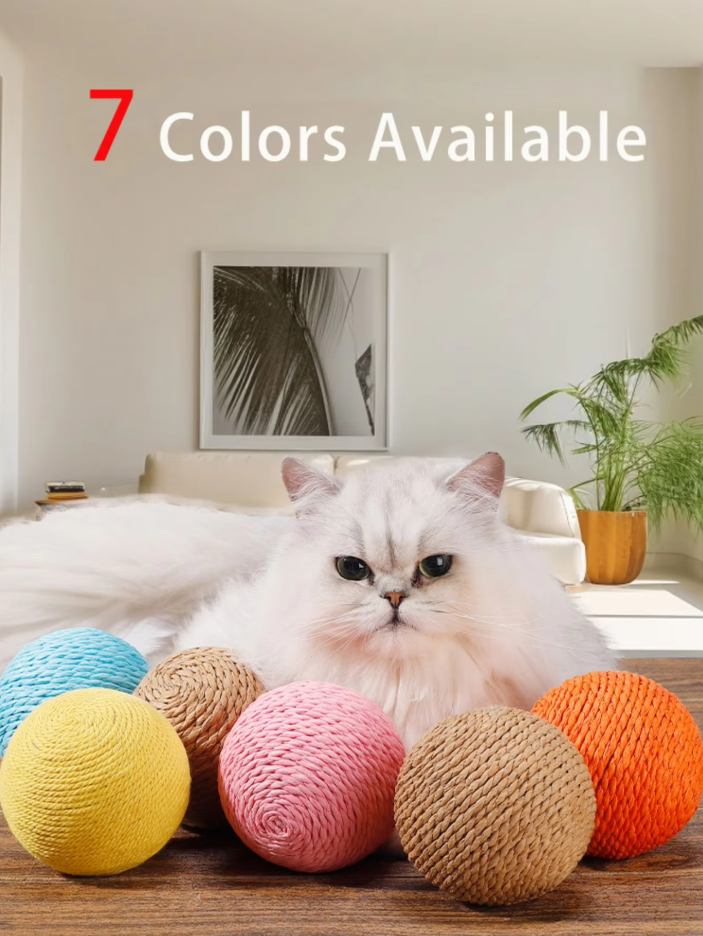 Feline enjoying an eco-friendly sisal scratching play ball; an ideal interactive cat toy for claw health.