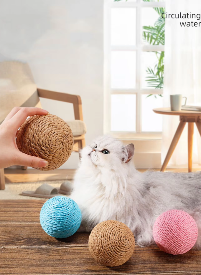 Round sisal cat scratch ball, a durable & natural toy for your cat's scratching needs.