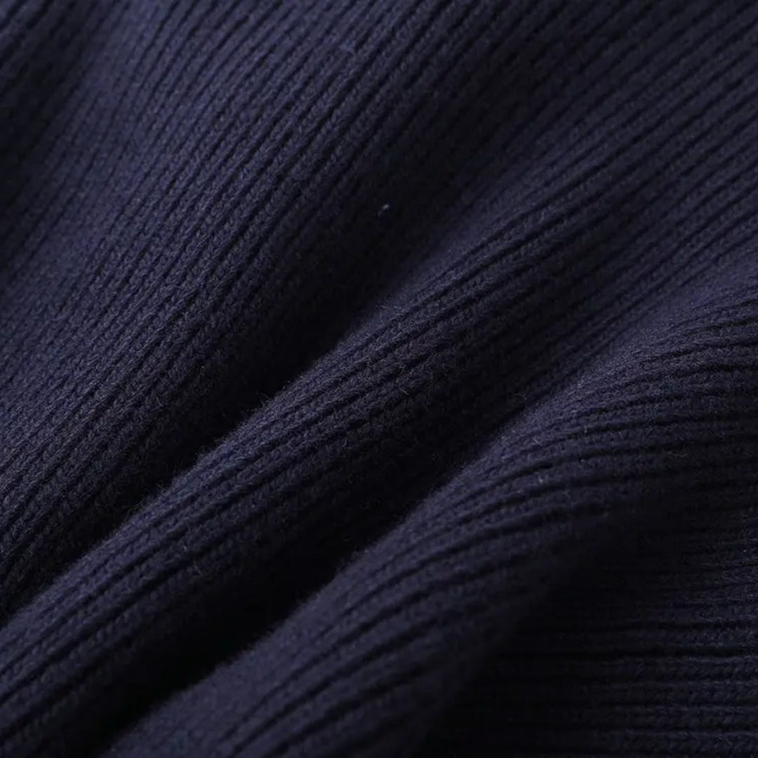Stylish women's navy spring cardigan jacket, layered look, button detailing, casual.