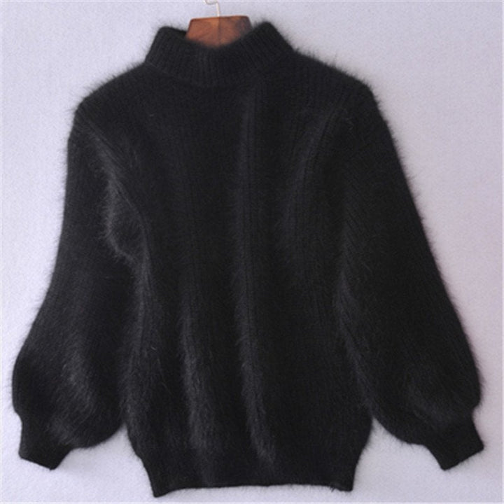 Close-up of the plush texture of a women's cozy mohair blend turtleneck sweater, ideal for winter fashion