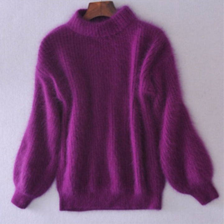 Detail of the turtleneck collar on a women's cozy mohair blend sweater, highlighting its comfort and warmth