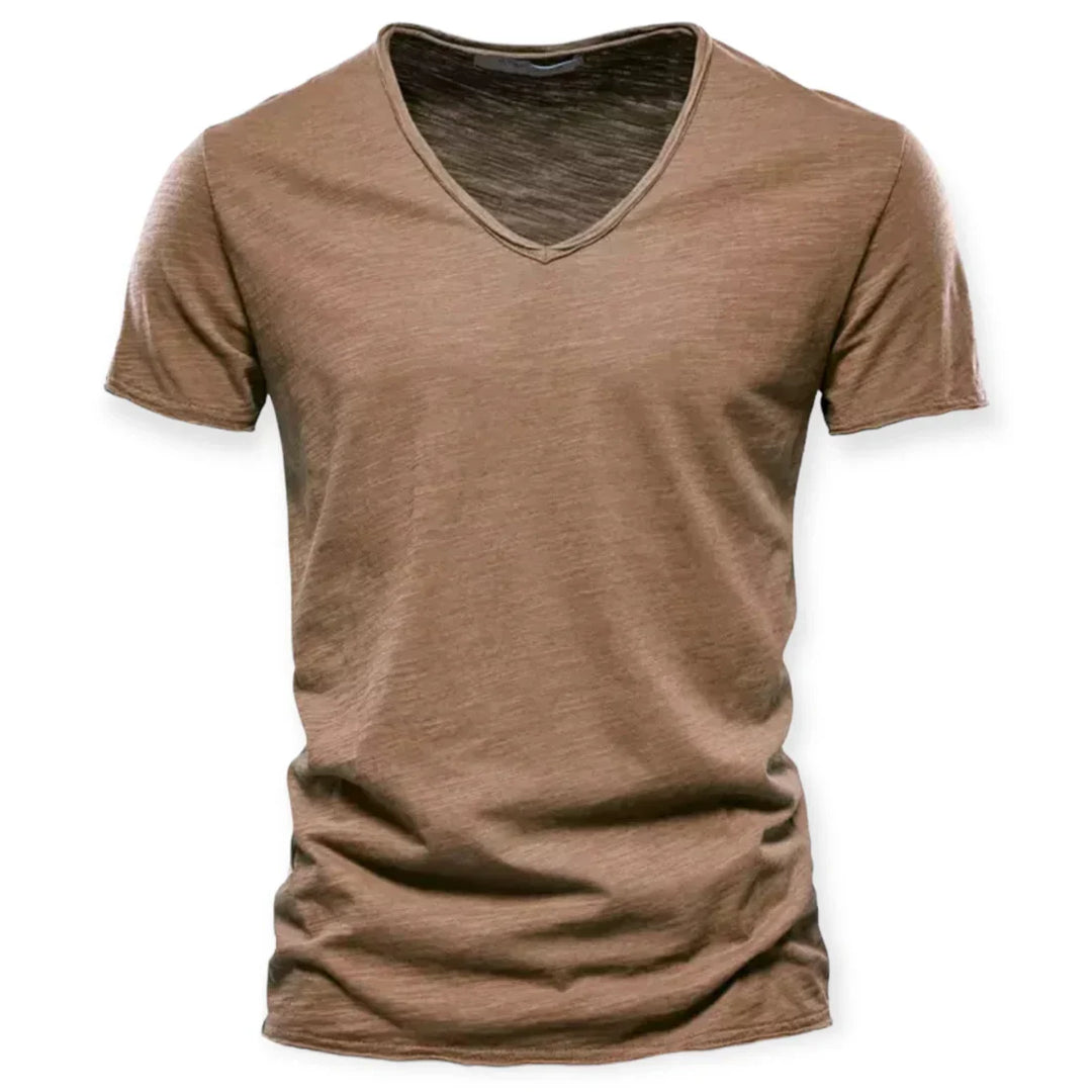 Close-up of the fabric texture of a new men's V-neck t-shirt, highlighting breathable cotton