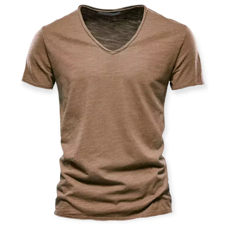 Close-up of the fabric texture of a new men's V-neck t-shirt, highlighting breathable cotton