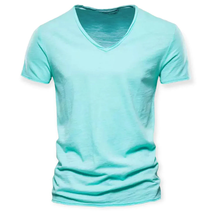 Detail of the V-neck collar on a men's classic t-shirt, emphasizing its modern design