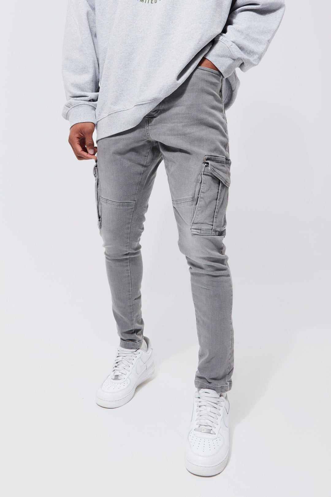 New men's premium stretch slim fit jeans in dark wash, perfect for casual wear. Comfortable cotton blend denim.