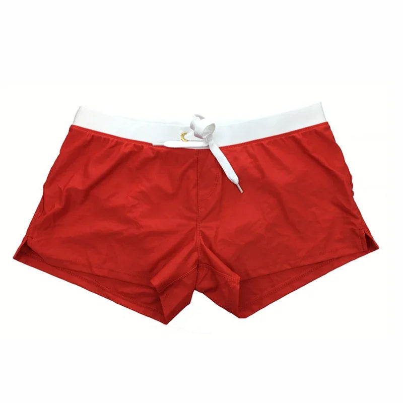 High-performance men's swim shorts, quick-dry fabric, adjustable drawstring for ultimate poolside style.