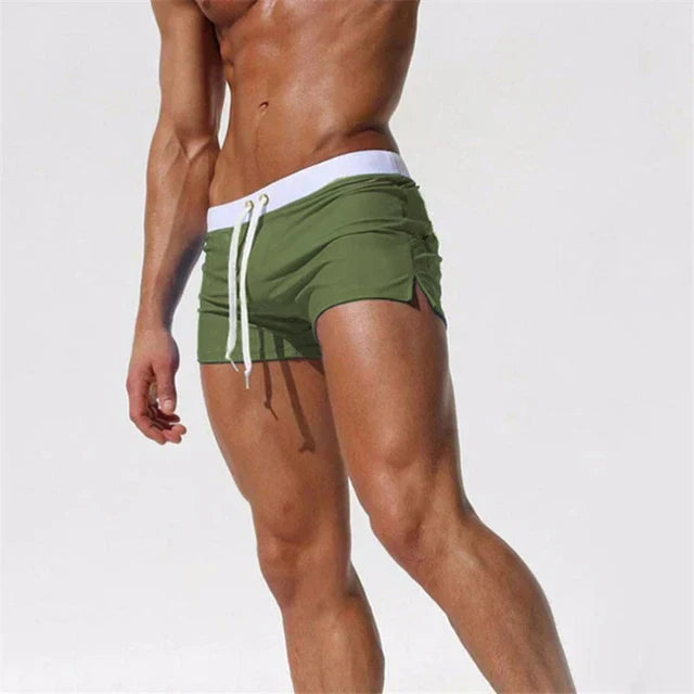 Men's quick-dry beachwear, durable fabric, adjustable drawstring, perfect for summer recreation.
