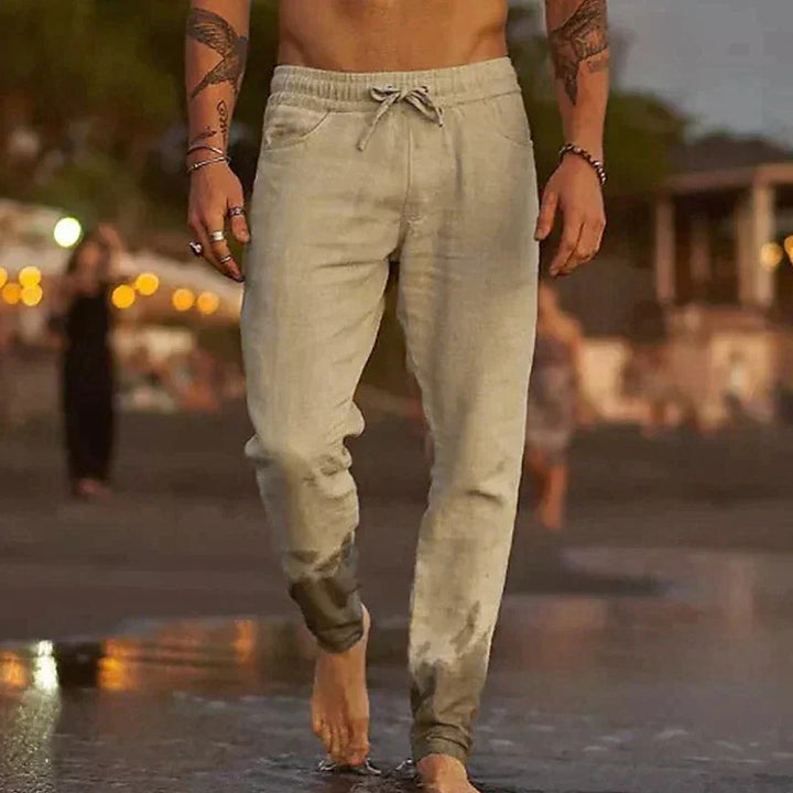 New men's relaxed fit linen pants in light beige, perfect for casual summer wear