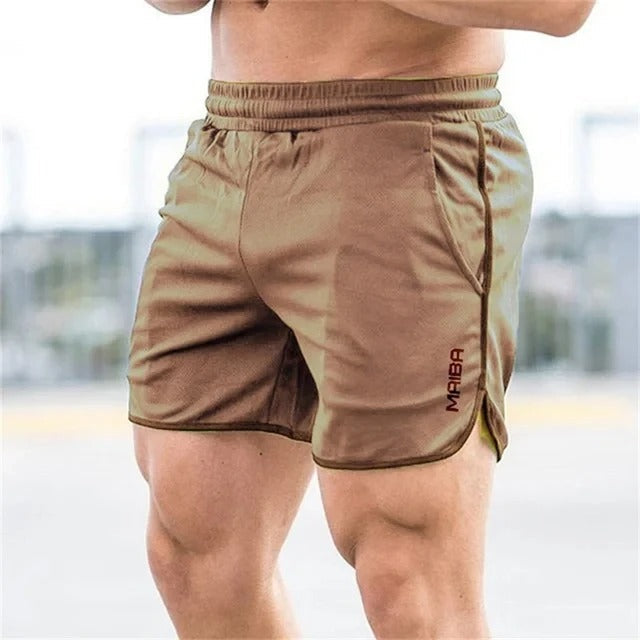 Flat lay of men's athletic quick dry swim trunks, emphasizing slim fit and beachwear style.