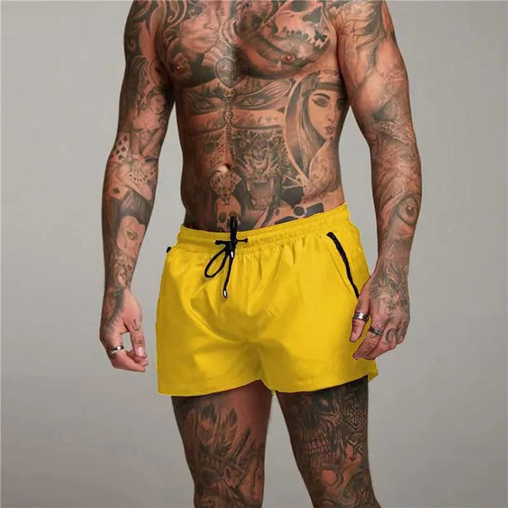 Men's new quick-dry swim shorts, stretchy black fabric, ideal pool shorts & beachwear.