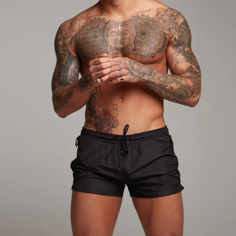 Stylish men's stretchy quick-dry swim shorts in red, suitable for both beach and pool activities.