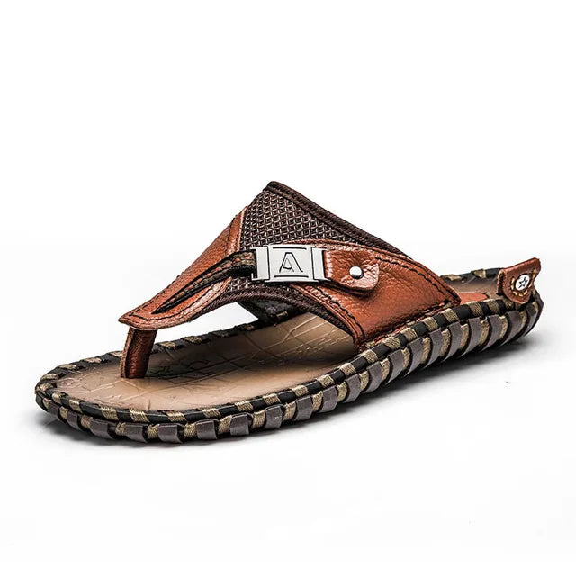 Pair of men's stylish leather flip-flops, comfortable and durable for everyday use.