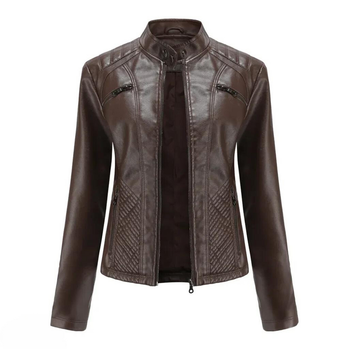 Detail shot of the textured faux leather on a women's brown moto jacket
