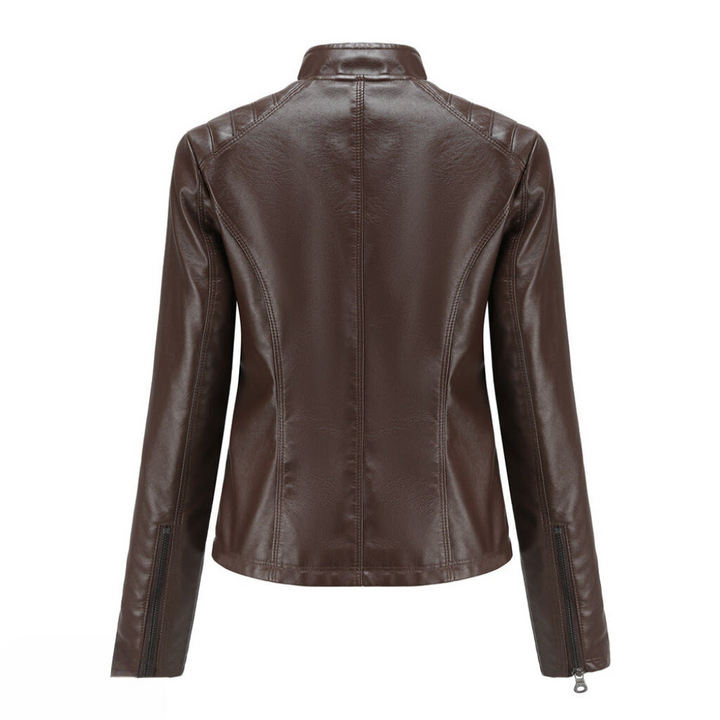 Women's brown faux leather moto jacket, zipped up, showing stylish collar detail