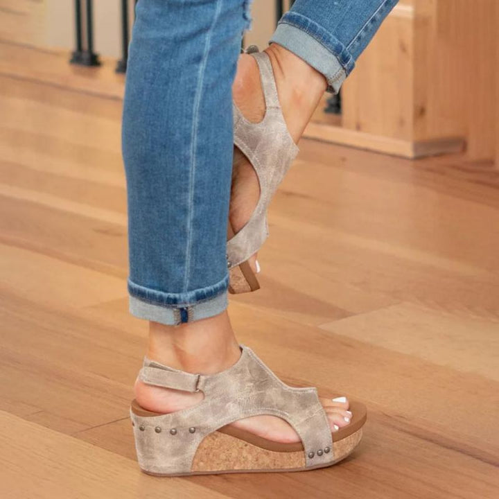 Comfortable women's leather sandals with advanced arch support and slip-resistant sole, ideal for summer