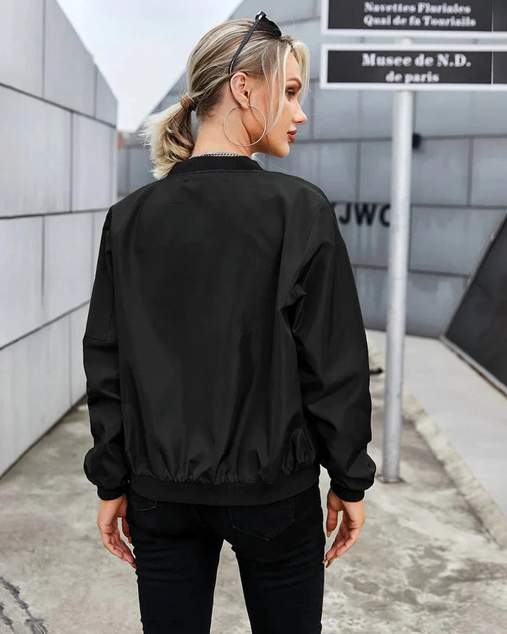 Front view of a new women's casual bomber jacket with fashion-forward design, zip closure