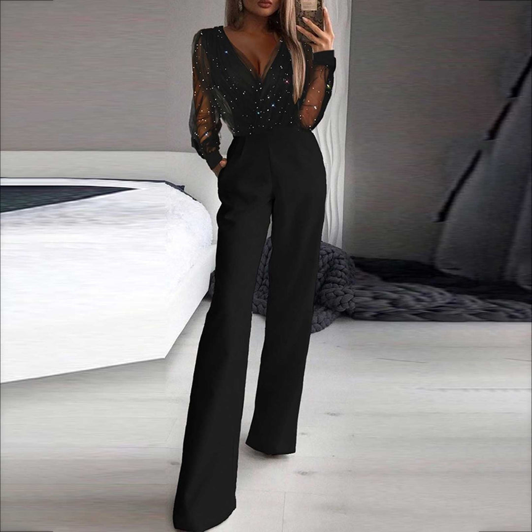 New women's comfortable black polyester jumpsuit, ideal for casual wear and versatile styling.