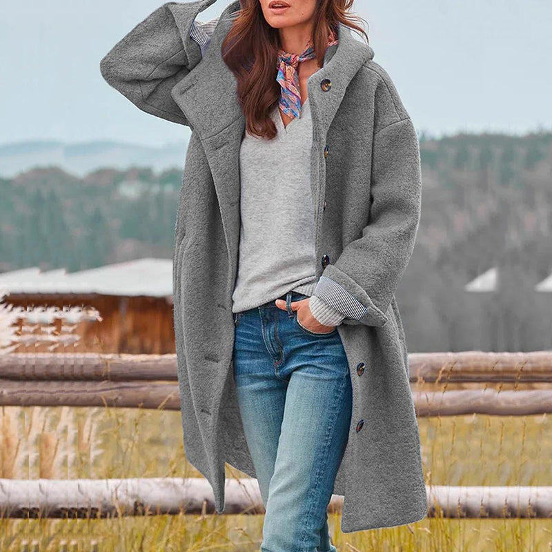 Stylish new women's long winter coat with hood, providing comfort and warmth as outerwear