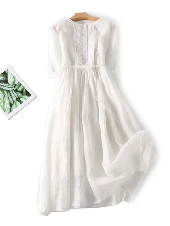 Airy linen summer dress with elegant ruffles for a casual yet chic look