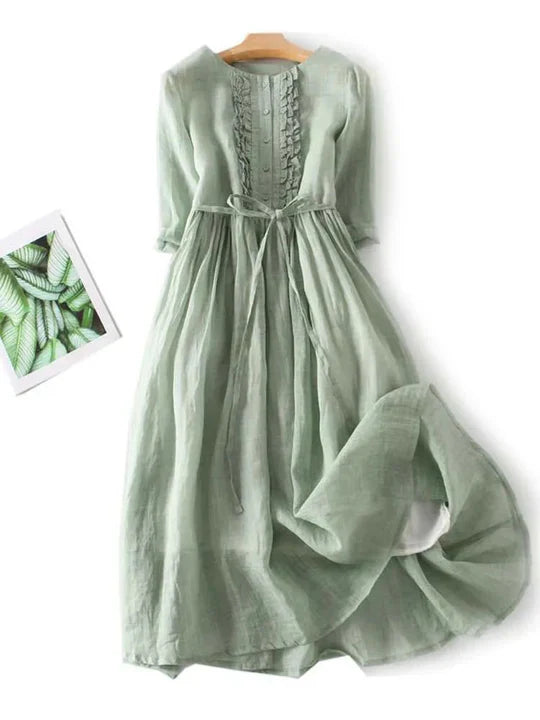 Elegant women's linen dress with stylish ruffles, great for summer casual or beach