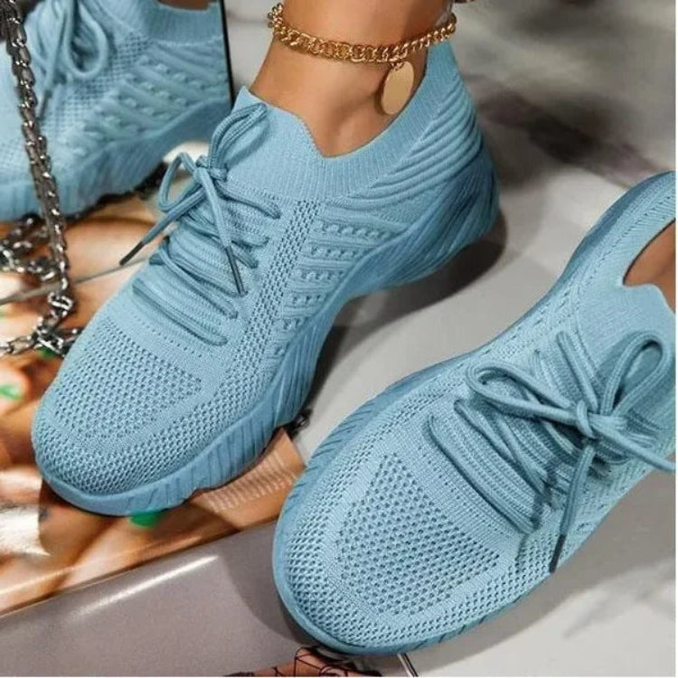 Stylish women's casual sneakers in mesh, new and lightweight, offering breathable footwear.