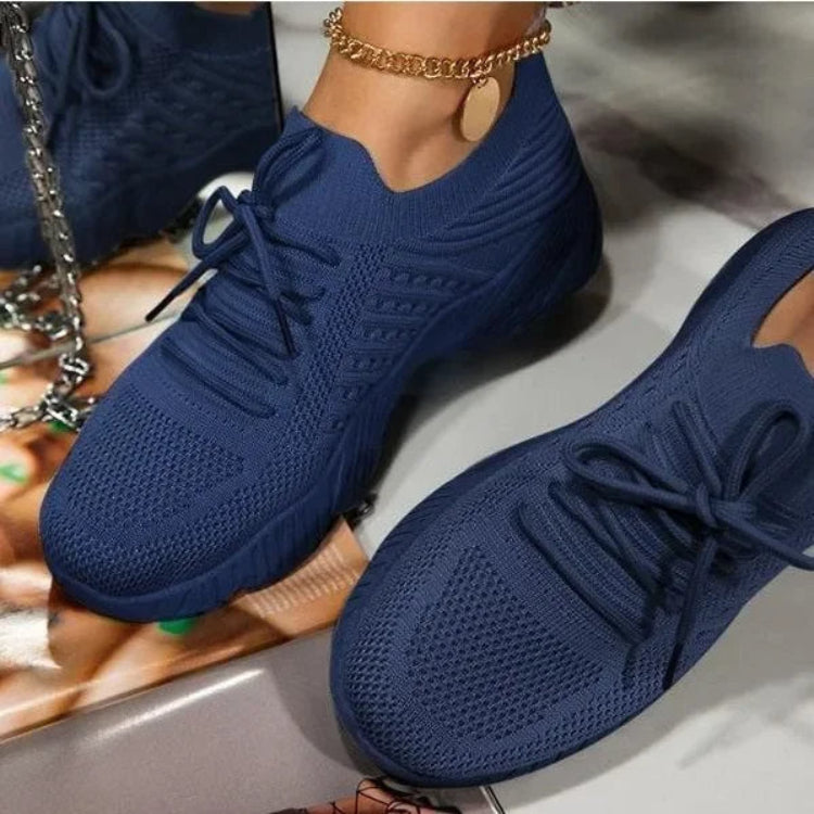 New women's walking sneakers, made with breathable mesh for lightweight and comfortable casual style.