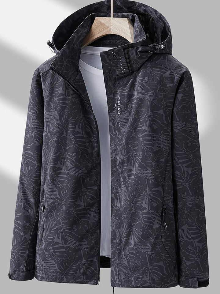 Lightweight charcoal polyester women's jacket with hood, wind and water-resistant design