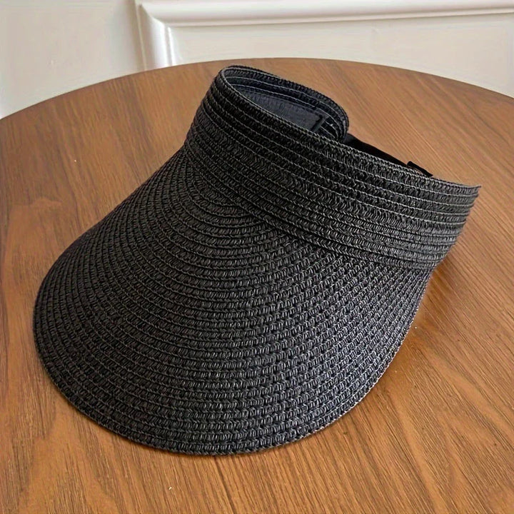 Adjustable new women's sun visor with wide brim, perfect for beachwear and sun protection.