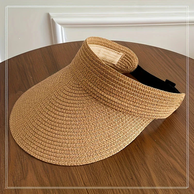 Women's fashion new foldable sun visor, wide-brim design with adjustable strap for outdoor use.